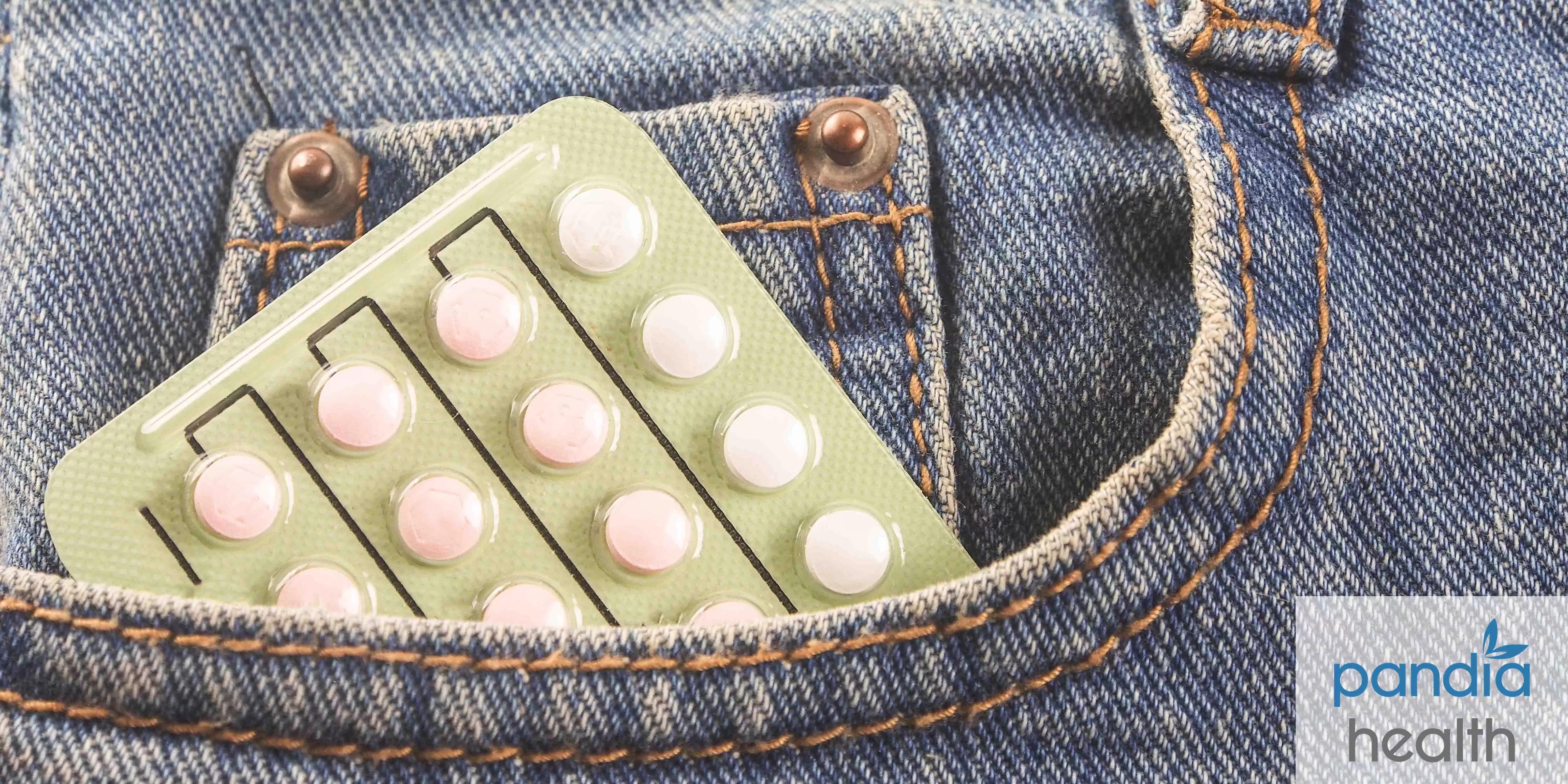 Birth control pill packet in denim jean pants pocket