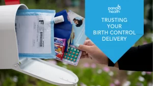 Hand taking out Pandia Health mailer from maibox, showing birth control pills and other goodies included