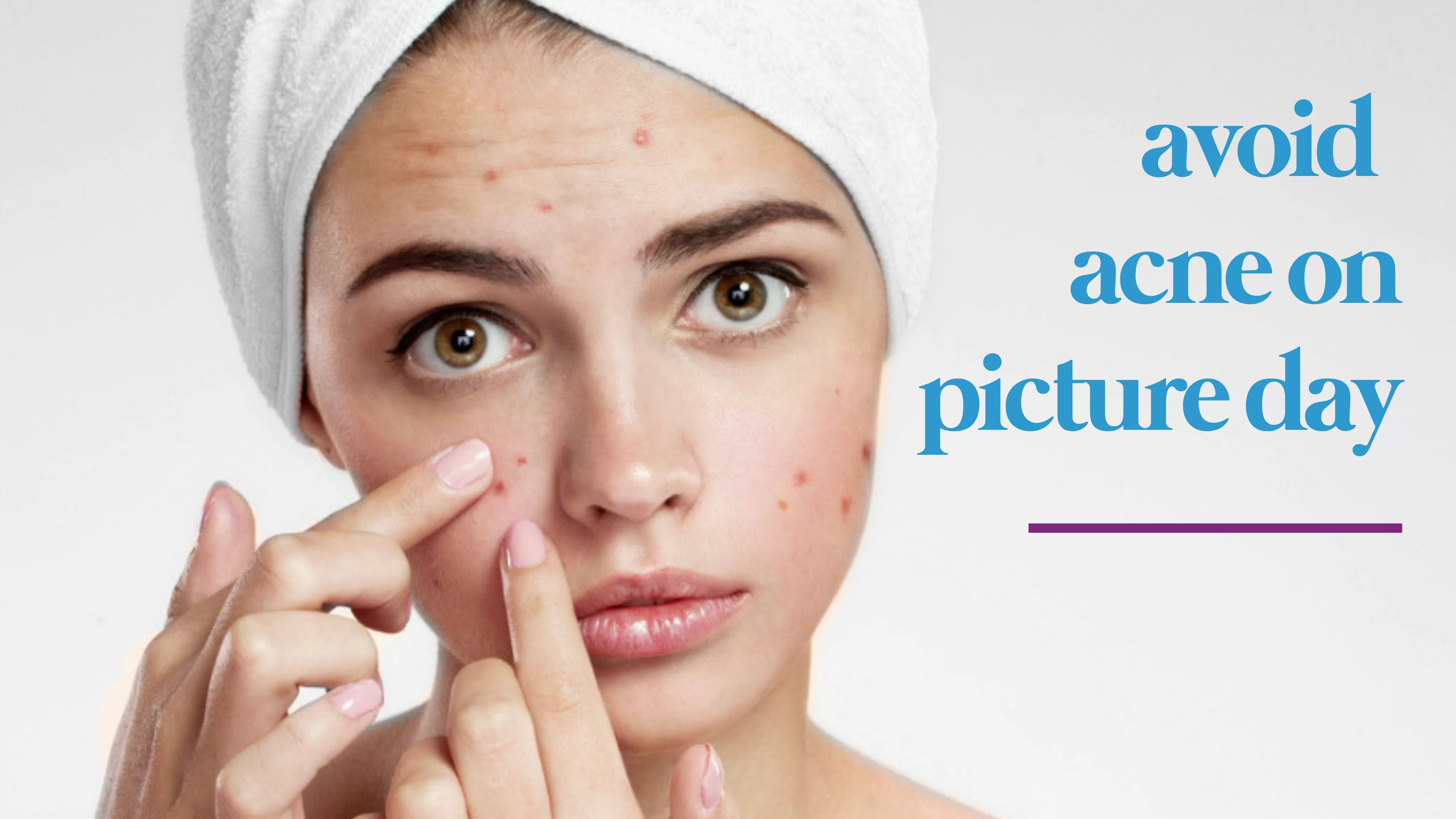 girl in a white hair towel staring into camera popping a pimple