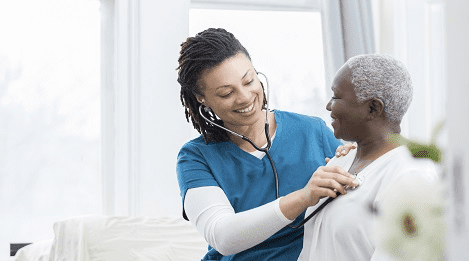 Doctor Taking Care of Elderly Woman