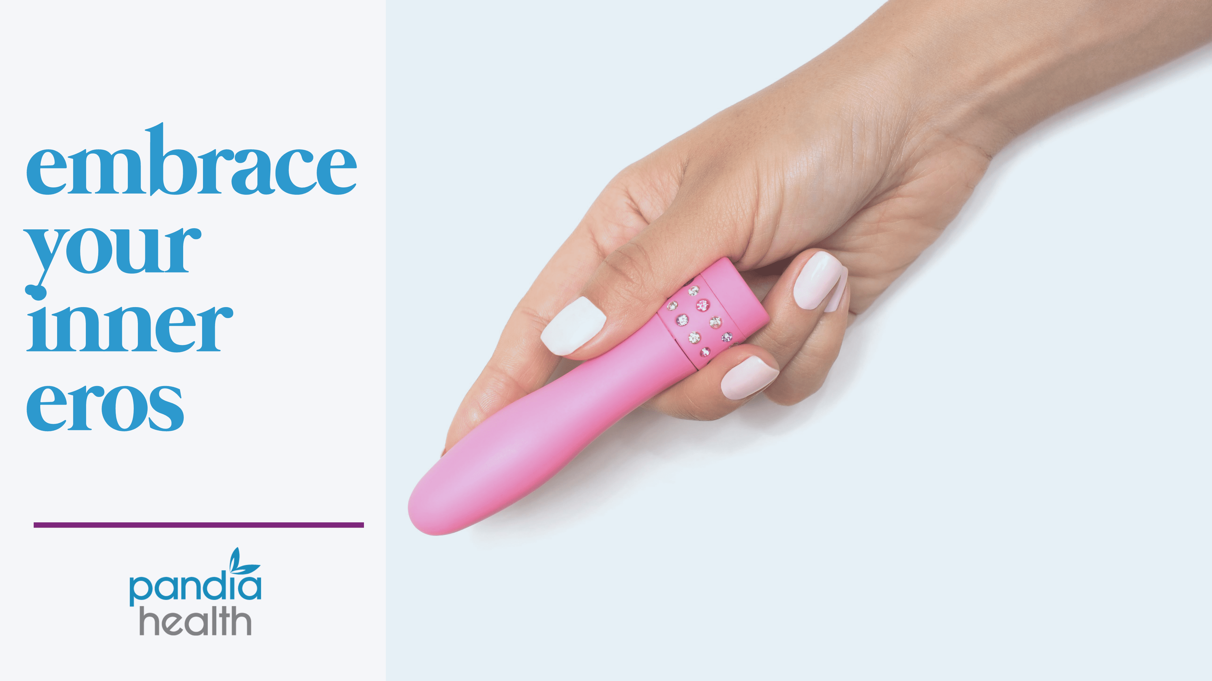 hand holding a small pink vibrator