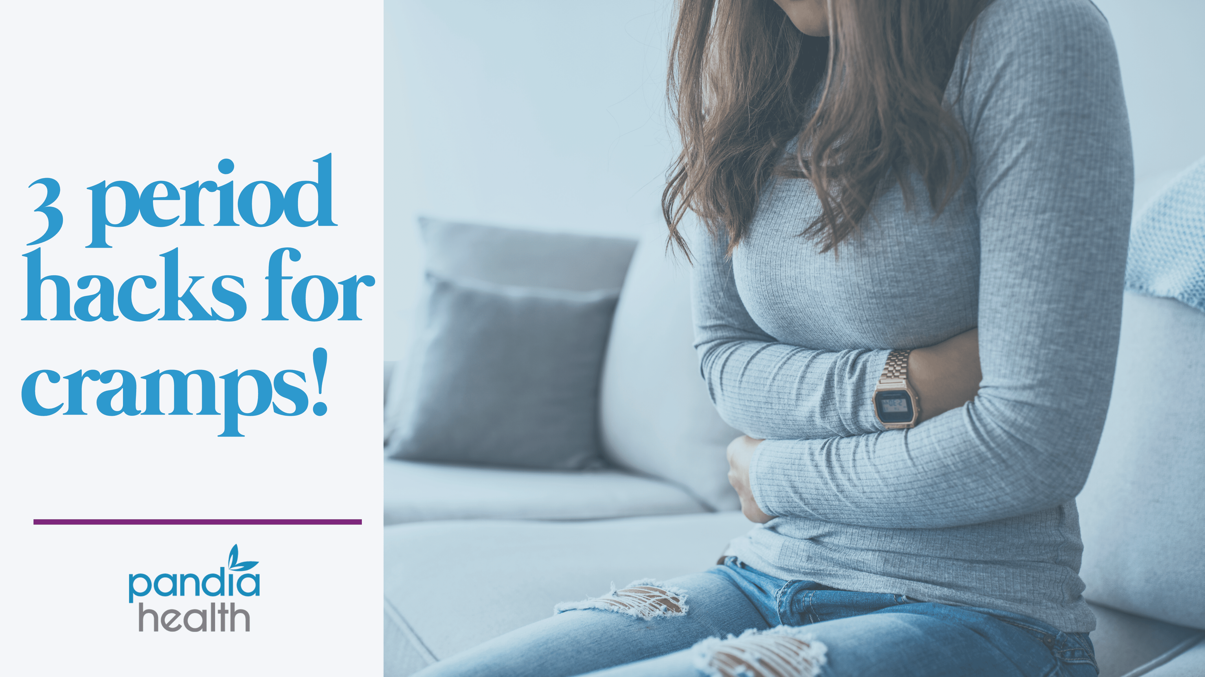 girl sitting on couch with hands around stomach