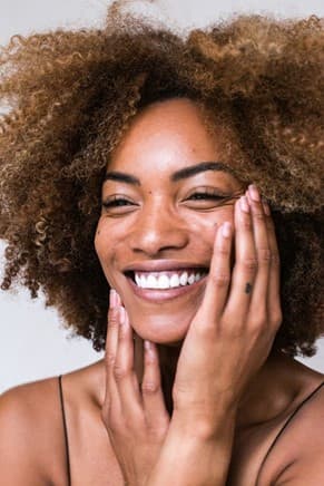 woman with acne on her face