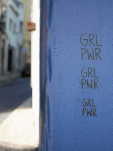 Girl power written on a wall